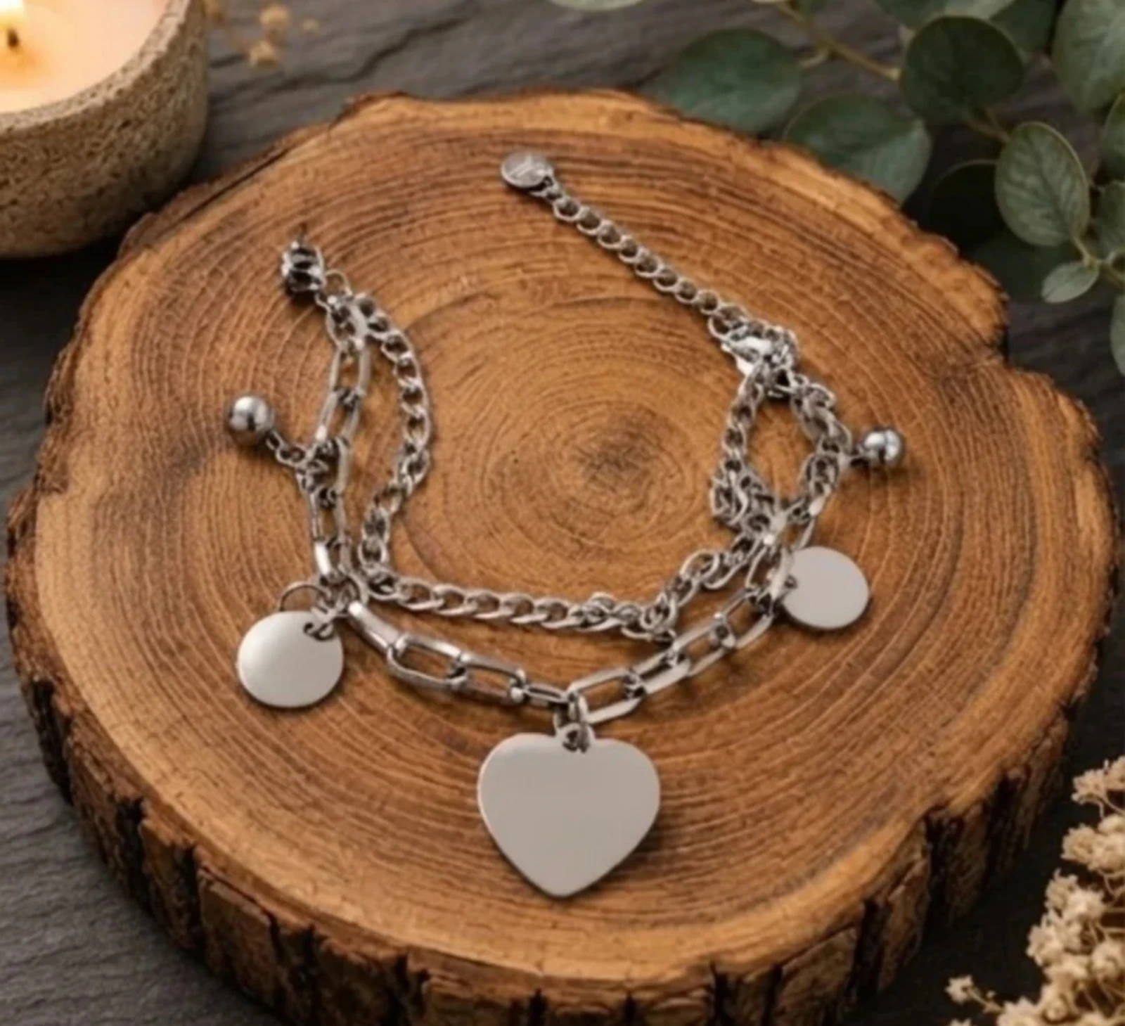 Pulsera de acero con charm de corazón